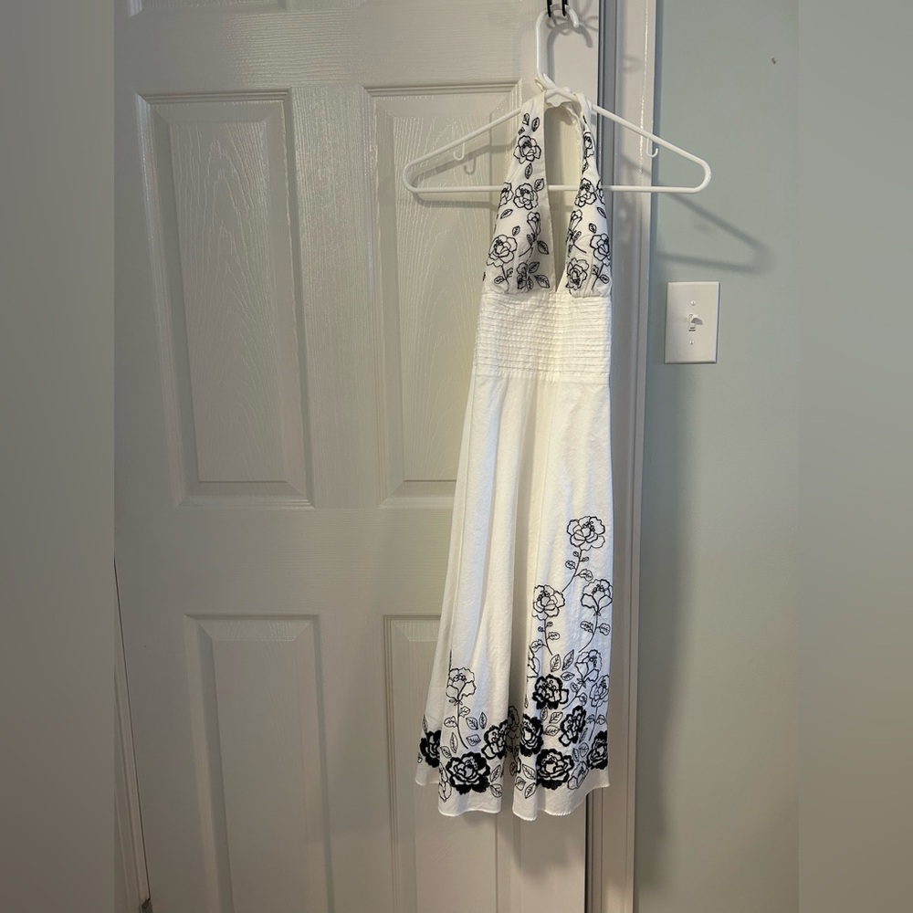 Elegant White Dress with Black Floral Design